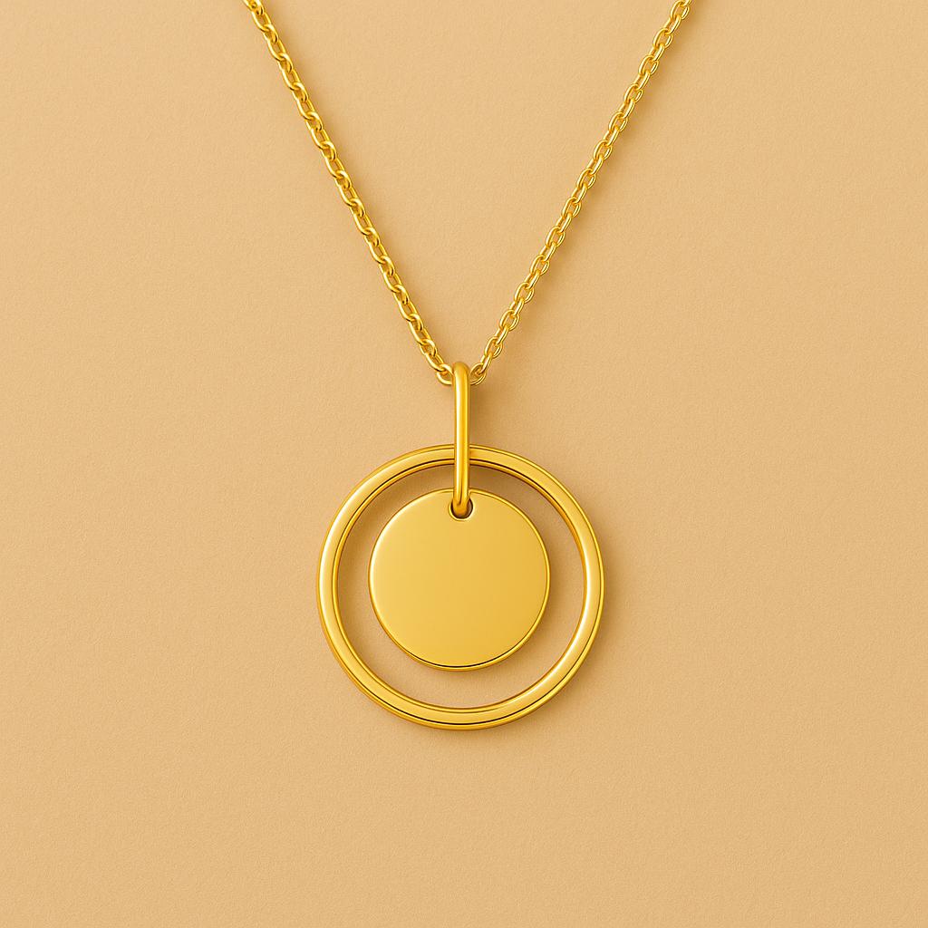 Gold necklace with a circular pendant on a beige background