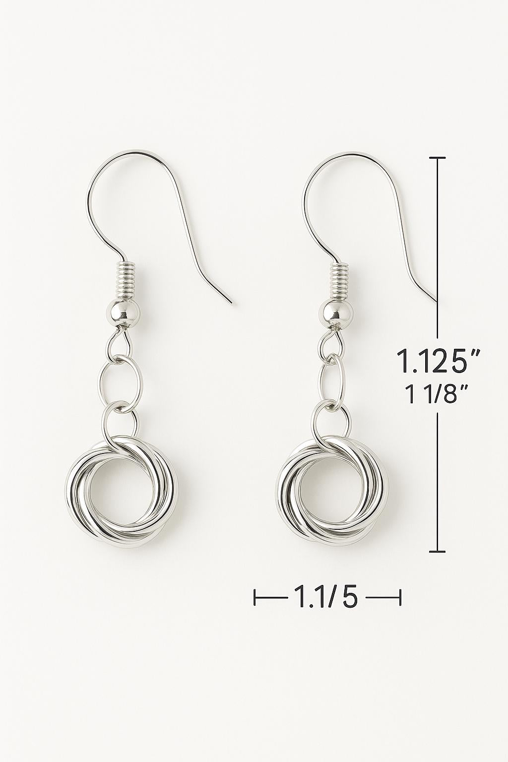sterling silver love knot earrings, silver knot earrings, love knot dangle earrings, minimalist silver earrings, dainty sterling silver earrings, handmade silver earrings, silver drop earrings, knot earrings for women, classic silver earrings, everyday silver earrings, silver jewelry gift for her, bridesmaid earrings silver, modern romantic jewelry, handcrafted sterling silver jewelry, lightweight dangle earrings, hypoallergenic silver earrings, symbolic knot jewelry, silver anniversary gift, artisan silver