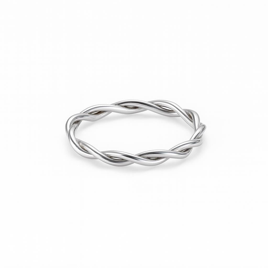 Silver twisted ring on a white background