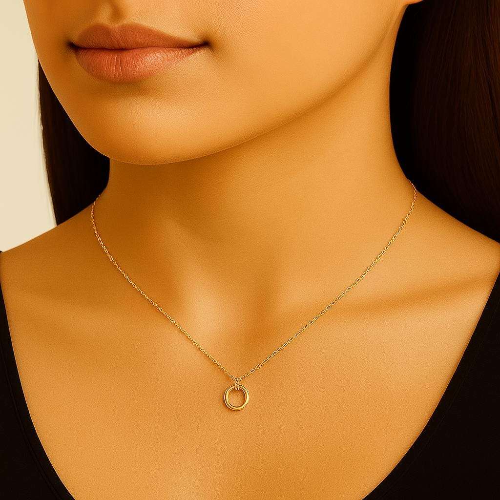 tiny circle necklace, minimalist gold necklace, sterling silver circle necklace, gold filled circle pendant, dainty everyday necklace, handcrafted silver necklace, modern gold necklace, simple layering necklace, delicate open circle pendant, fine handmade jewelry, St Clair Fine Jewelry necklace, gold and silver necklace, hypoallergenic jewelry, timeless minimalist jewelry, small circle necklace, round pendant necklace, elegant everyday necklace, handmade in USA jewelry, 14k gold filled jewelry, dainty chain