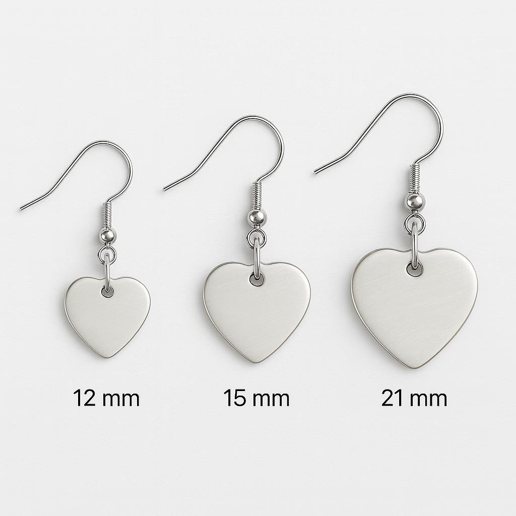 Heart-shaped earrings of different sizes on a white background