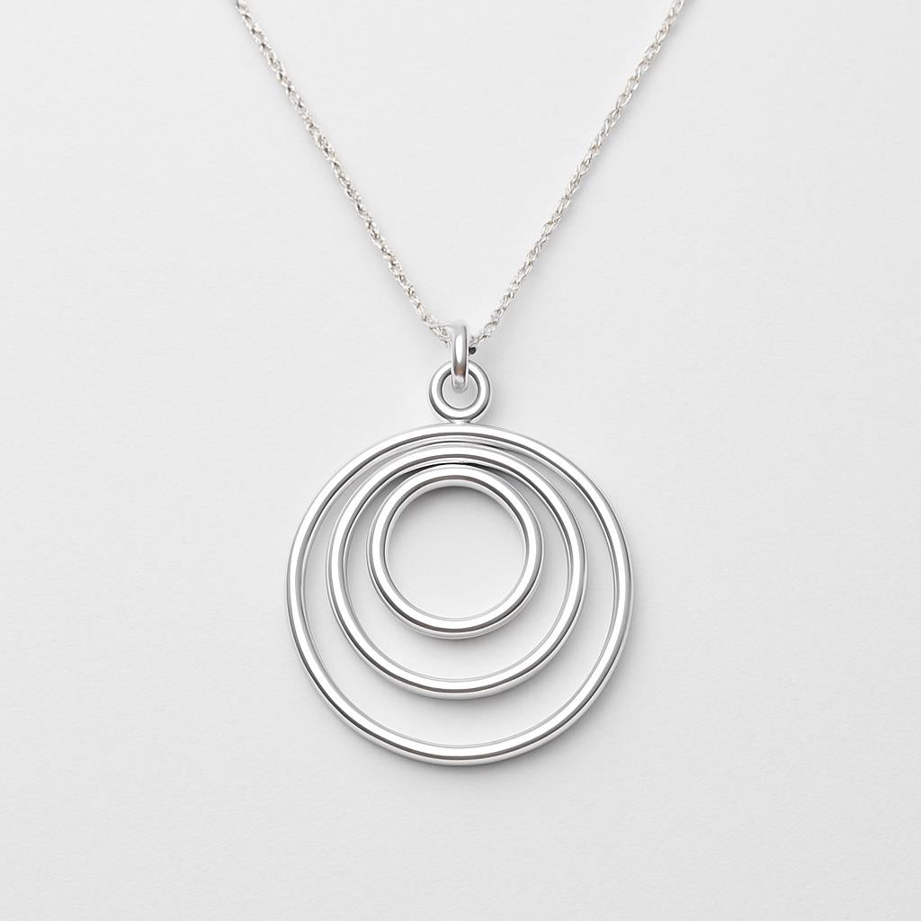 circle pendant necklace, sterling silver circle necklace, gold filled circle necklace, minimalist pendant necklace, handmade circle jewelry, concentric rings necklace, layered circle pendant, everyday necklace for women, dainty gold necklace, dainty silver necklace, modern minimalist necklace, geometric pendant necklace, gold and silver jewelry, simple round pendant necklace, handcrafted silver necklace, 14k gold filled jewelry, silver layering necklace, gift for her jewelry, anniversary jewelry gift, bride