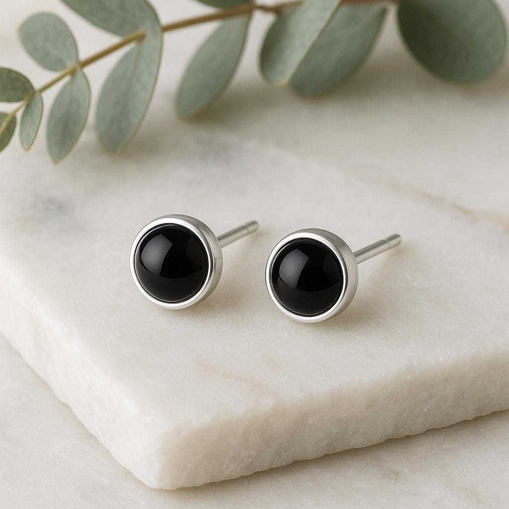 black onyx stud earrings, gold filled onyx studs, sterling silver onyx studs, gemstone stud earrings, minimalist black earrings, dainty onyx jewelry, handcrafted gemstone jewelry, modern gold earrings, elegant everyday earrings, small black earrings, black stone studs, gold and silver earrings, hypoallergenic earrings, nickel free jewelry, gemstone jewelry gift, protection stone jewelry, grounding stone earrings, St Clair Fine Jewelry earrings, handmade in USA jewelry, timeless black earrings, minimalist fi