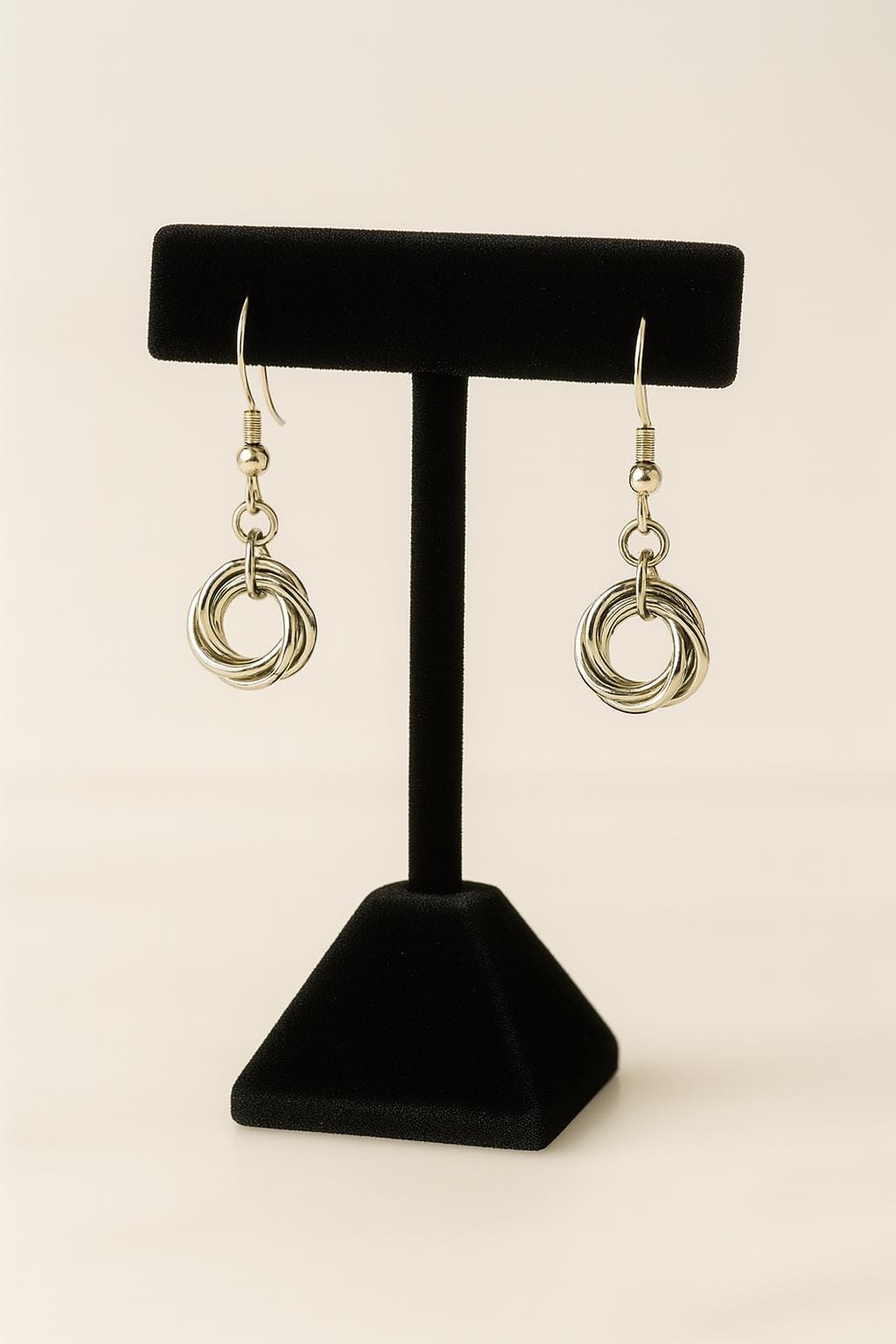 14k gold filled love knot earrings, gold knot earrings, gold dangle earrings, minimalist gold earrings, handmade gold jewelry, gold drop earrings, love knot earrings for women, dainty gold earrings, classic gold earrings, everyday gold jewelry, gold jewelry gift for her, bridesmaid gold earrings, romantic gold jewelry, handcrafted gold earrings, lightweight gold earrings, hypoallergenic gold earrings, symbolic knot jewelry, gold anniversary gift, artisan gold earrings, made in USA jewelry, gold love knot ea
