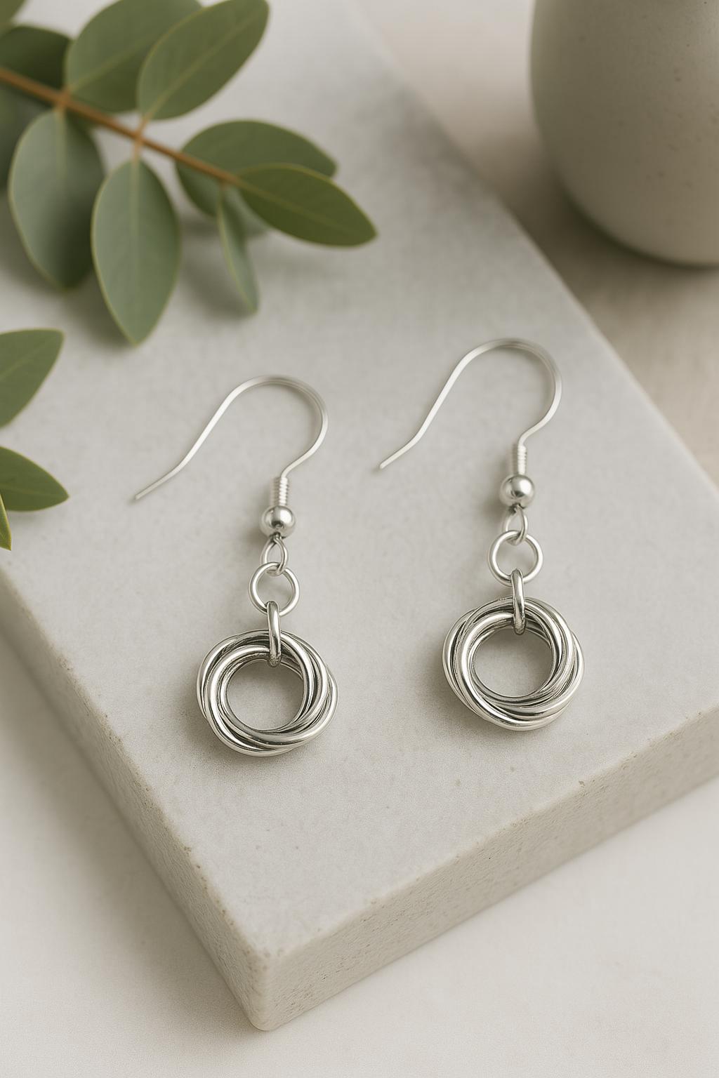 14k gold filled love knot earrings, gold knot earrings, gold dangle earrings, minimalist gold earrings, handmade gold jewelry, gold drop earrings, love knot earrings for women, dainty gold earrings, classic gold earrings, everyday gold jewelry, gold jewelry gift for her, bridesmaid gold earrings, romantic gold jewelry, handcrafted gold earrings, lightweight gold earrings, hypoallergenic gold earrings, symbolic knot jewelry, gold anniversary gift, artisan gold earrings, made in USA jewelry, gold love knot ea