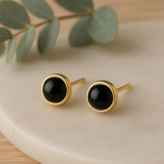 black onyx stud earrings, gold filled onyx studs, sterling silver onyx studs, gemstone stud earrings, minimalist black earrings, dainty onyx jewelry, handcrafted gemstone jewelry, modern gold earrings, elegant everyday earrings, small black earrings, black stone studs, gold and silver earrings, hypoallergenic earrings, nickel free jewelry, gemstone jewelry gift, protection stone jewelry, grounding stone earrings, St Clair Fine Jewelry earrings, handmade in USA jewelry, timeless black earrings, minimalist fi