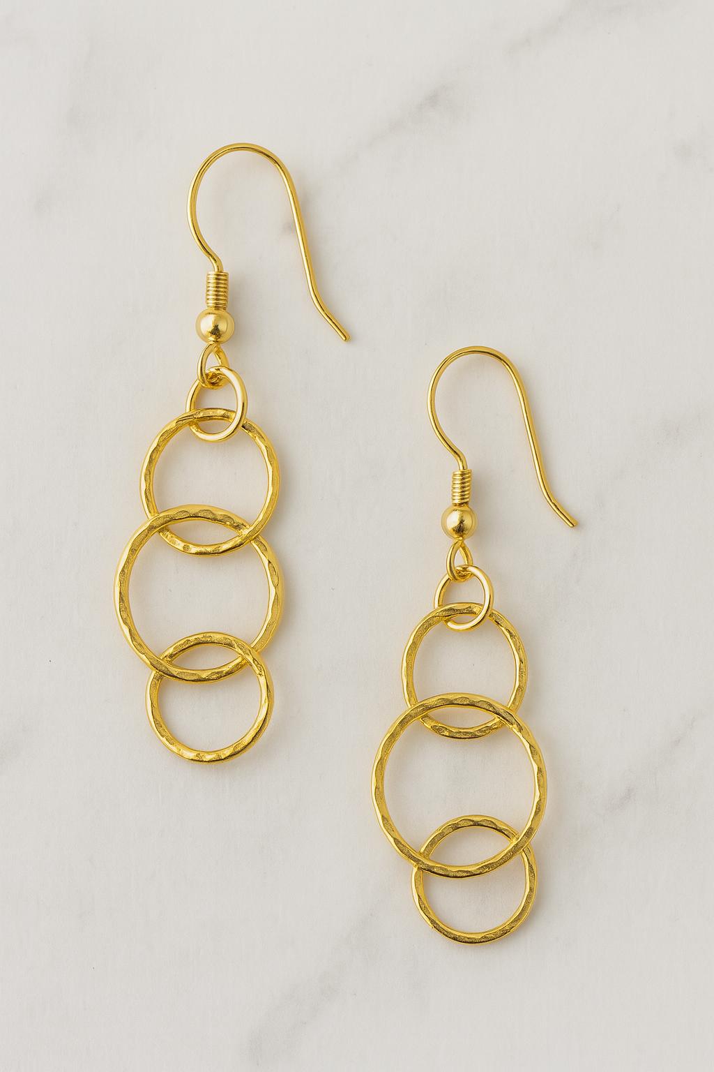 old hoop earrings, triple hoop dangle earrings, minimalist gold jewelry, handmade gold earrings, lightweight statement earrings, modern boho jewelry, St Clair Fine Jewelry