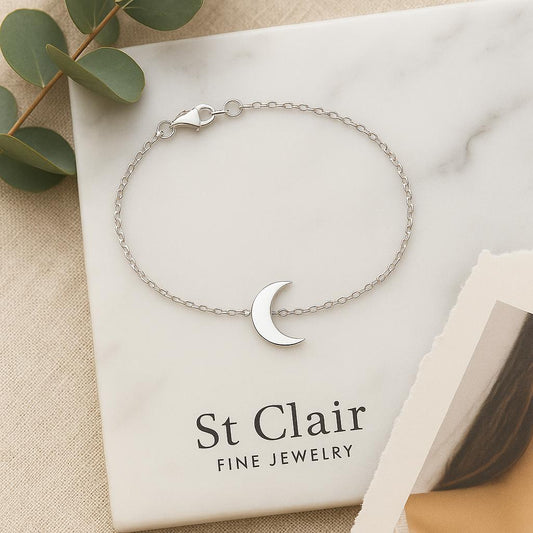 Silver bracelet with moon design on a St Clair Fine Jewelry box