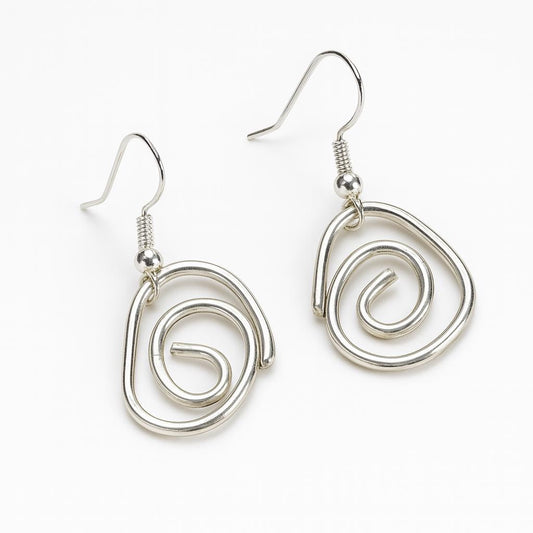 Silver spiral earrings on a white background