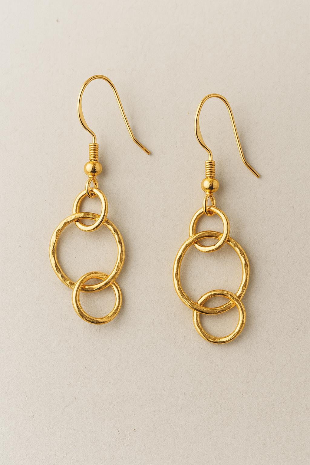 old hoop earrings, triple hoop dangle earrings, minimalist gold jewelry, handmade gold earrings, lightweight statement earrings, modern boho jewelry, St Clair Fine Jewelry